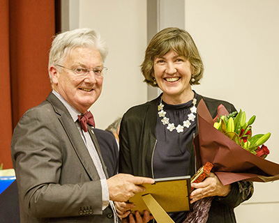 Peter Dunne presenting Claire with North Wellington Voluntary Services Award